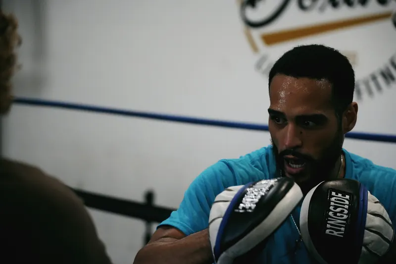 Jeremiah calling a combination on the mitts